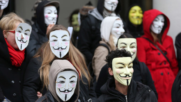Pro-democracy protesters wearing Guy Fawkes masks pose in central Brussels November 5, 2014, on the day marking Guy Fawkes Nigh (Reuters / Francois Lenoir)