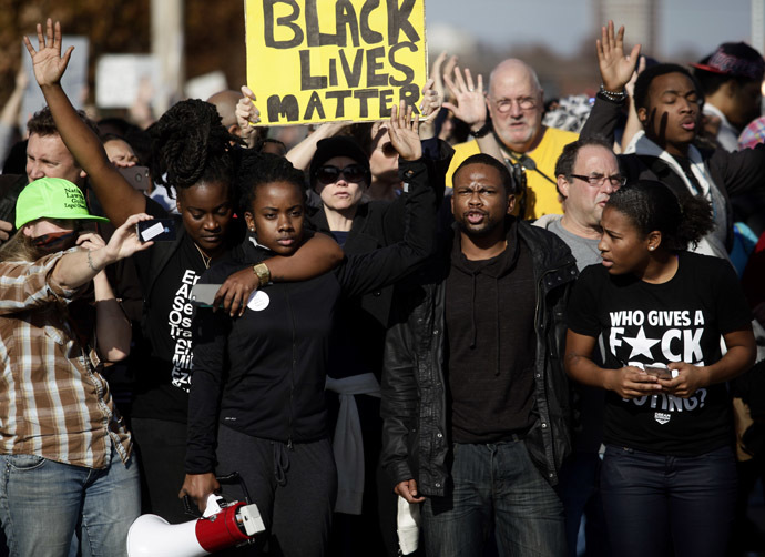 Demonstrators protest the shooting death of Michael Brown November 29, 2014 in Brentwood, Missouri. (oshua Lott/Getty Images/AFP)