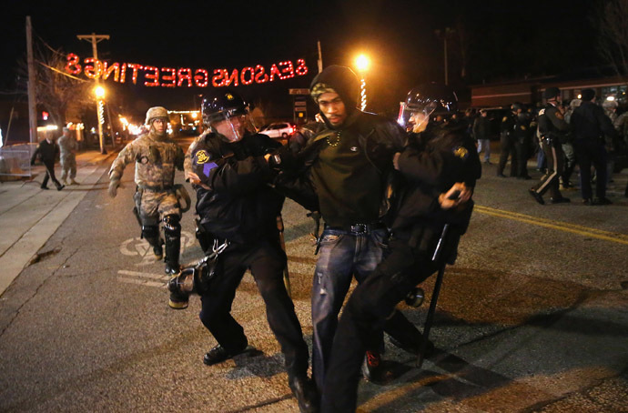 Police arrest a demonstrator outside the police station November 28, 2014 in Ferguson, Missouri. (Scott Olson/Getty Images/AFP)