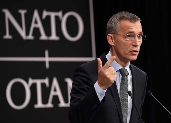 North Atlantic Treaty Organisation (NATO) secretary general Jens Stoltenberg holds a press conference at the NATO headquarters in Brussels on December 1, 2014 (AFP Photo / John Thys)