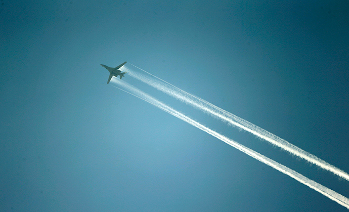 A U.S.-led coalition aircraft flying over Kobanii, as seen from near the Mursitpinar border crossing on the Turkish-Syrian border in the southeastern town of Suruc in Sanliurfa province (Reuters / Kai Pfaffenbach)