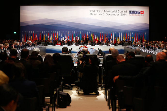 Delegates attend a meeting of foreign ministers from the Organization for Security and Co-operation in Europe (OSCE) in Basel December 4, 2014. (Reuters / Ruben Sprich)