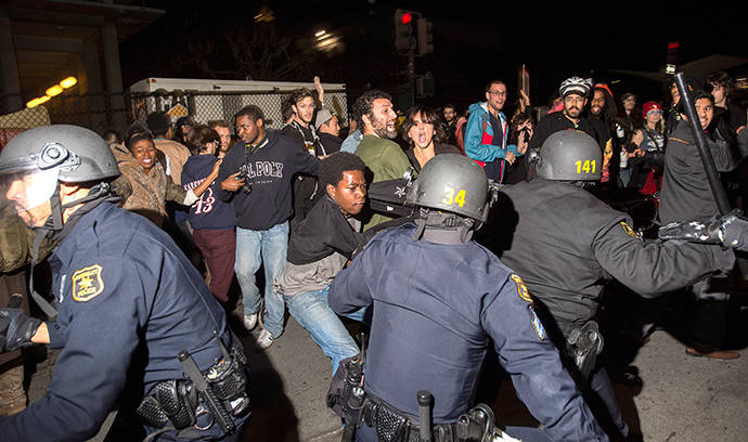 olice officers scuffle with protesters during a protest against police violence in the U.S., in Berkeley, California December 6, 2014 (Reuters / Noah Berger)
