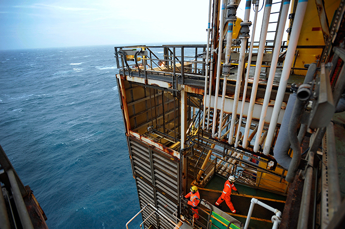Employees work on the BP Eastern Trough Area Project (ETAP) oil platform (Reuters / Andy Buchanan)
