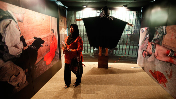 A life-size mannequin called "Man in the Hood" is displayed at the "War Is A Crime" exhibition in Kuala Lumpur November 19, 2011.(Reuters / Bazuki Muhammad)