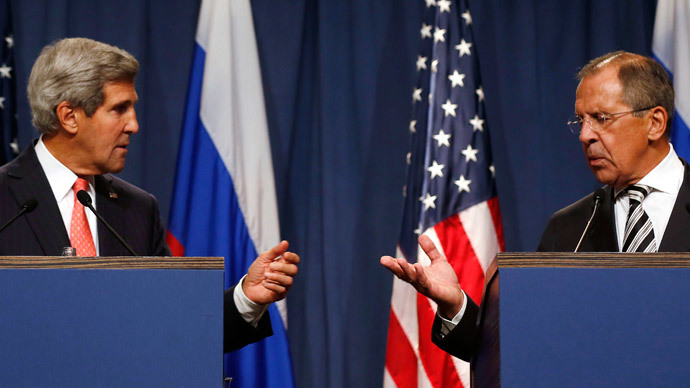 U.S. Secretary of State John Kerry (L) and Russian Foreign Minister Sergei Lavrov gesture, following meetings regarding Syria, at a news conference in Geneva September 14, 2013.( Reuters / Larry Downing)