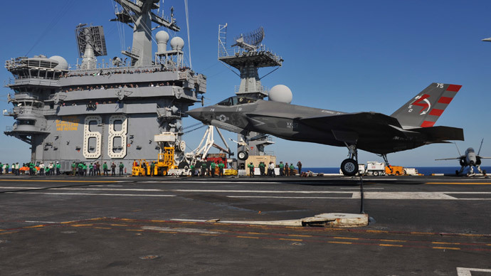 F-35C Lightening II carrier variant Joint Strike Fighter conducting it's first arrested landing aboard the aircraft carrier USS Nimitz.(AFP Photo / Kelly M. Agee)