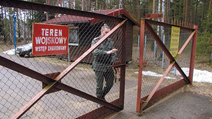 A guard shuts the gate to the airport in Szymany in northeastern Poland in this file 2005 picture. Polish media said November 5, 2005 the airport was identified by Human Rights Watch as a potential site of alleged CIA prisons used to interrogate al Qaeda captives. Poland strongly denied it was hosting such facilities.(Reuters / Tomasz Marek)