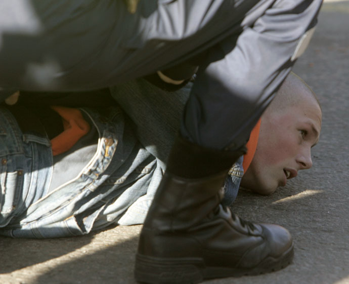 Estonian riot police arrest a Russian-speaking protestor demonstrating against the removal of a bronze statue of a Red Army Soviet soldier in Tallinn April 27, 2007. (Reuters/Ints Kalnins)