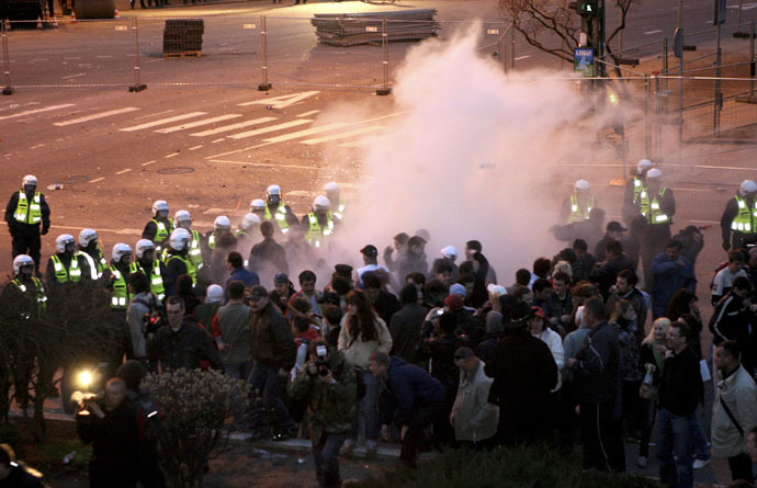 Riot policemen use tear gas during clashes with protesters demonstrating against the government's decision to close the entrance to the Bronze Soldier monument in downtown Tallinn April 26, 2007. (Reuters)