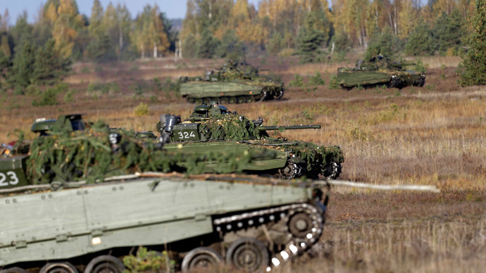 CV-90 combat vehicles from the Norwegian army attend the Silver Arrow NATO military exercise in Adazi, Latvia.(Reuters / Ints Kalnins)
