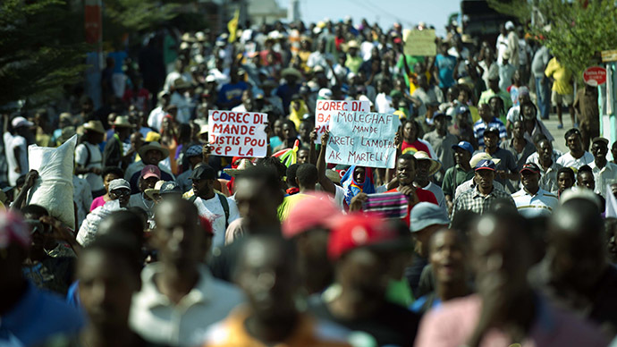 Haiti PM steps down amid anti-govt protests (PHOTOS, VIDEO)