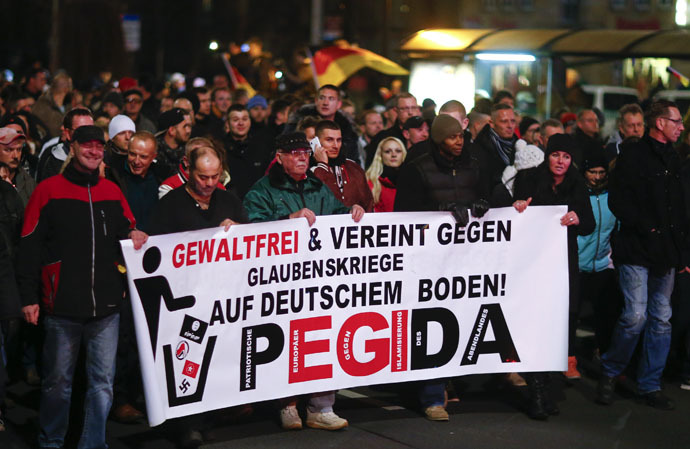 Participants hold a banner during a demonstration called by anti-immigration group PEGIDA, a German abbreviation for "Patriotic Europeans against the Islamization of the West", in Dresden December 15, 2014. (Reuters)