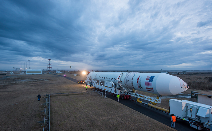This NASA handout photo shows An Orbital Sciences Corporation Antares rocket seen as it is rolled out to launch Pad-0A at NASA's Wallops Flight Facility on January 5, 2014 in advance of a planned January 8 launch, Wallops Island, Virginia. (AFP Photo / NASA / Bill Ingalls / Handout)