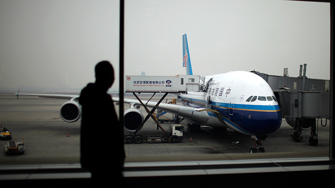 Early exit? Chinese first-time flyer opens plane emergency door