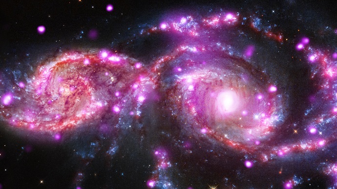Galaxies spiral into each other, create spectacular light show (VIDEO, PHOTOS)