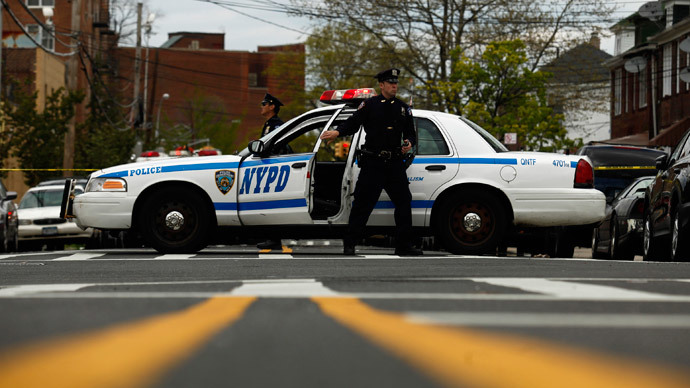 Plainclothes NYPD officer hits teen subdued by other cops (VIDEO)