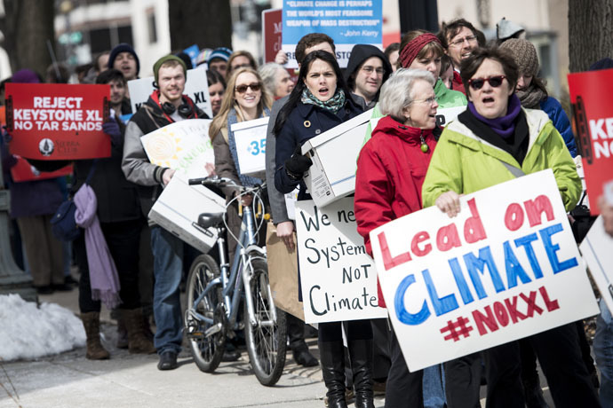 Activists march during a protest of the Keystone XL pipeline in Washington. (AFP Photo/Brendan Smialowski)