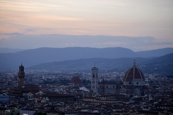 A general view shows a panorama of the city of Florence with the Duomo (R) of the cathedral Santa Maria del Fiore and the tower of the Palazzo Vecchio (L), Florence's city hall (AFP Photo / Filippo Monteforte)