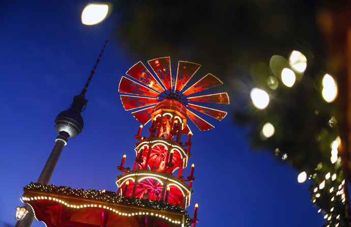 A Christmas pyramid is pictured next to the television tower at the Christmas market at Alexanderplatz square in Berlin. (Reuters/Hannibal Hanschke )