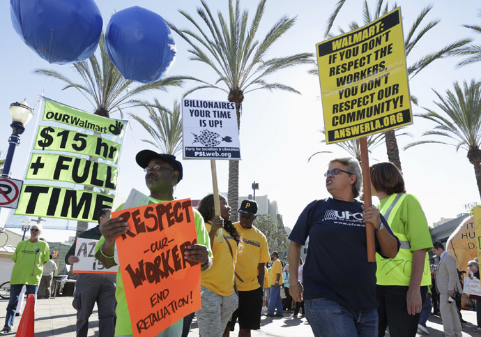 People march during a Black Friday protest against Walmart in Long Beach, California November 28, 2014. (Reuters/Jonathan Alcorn)