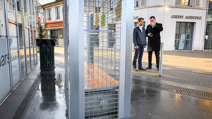 Anti-homeless cages installed around benches in French city on Christmas Eve