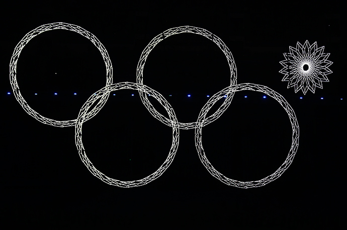 Four out of five Olympic rings are seen lit up during the opening ceremony of the 2014 Sochi Winter Olympics, in this February 7, 2014 (Reuters / David Gray)