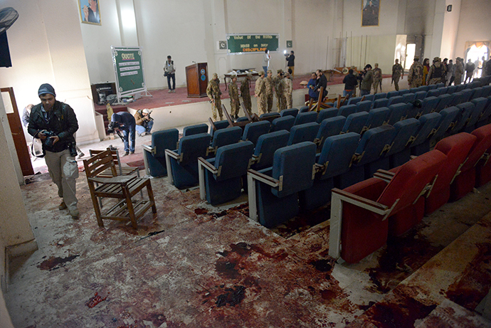 Pakistani soldiers and media gather in a ceremony hall at an army-run school a day after an attack by Taliban militants in Peshawar on December 17, 2014. (AFP Photo / A Majeed)