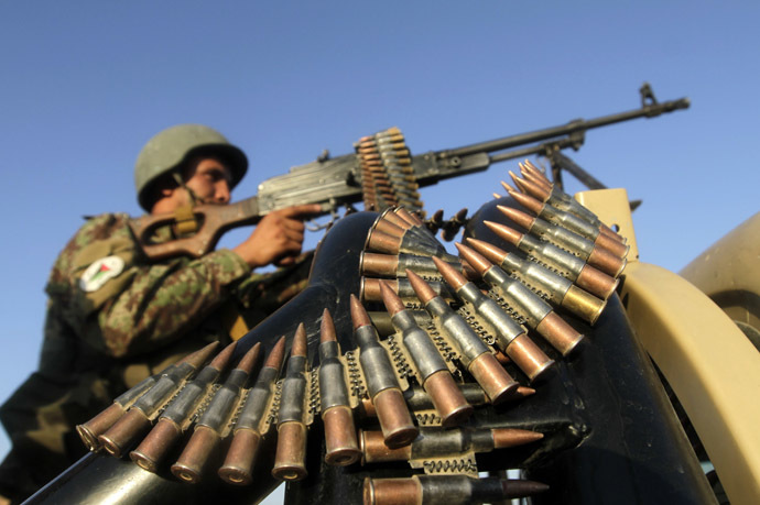 An Afghan National Army (ANA) soldier keeps watch at a checkpoint on the outskirts of Jalalabad city. (Reuters/Parwiz)