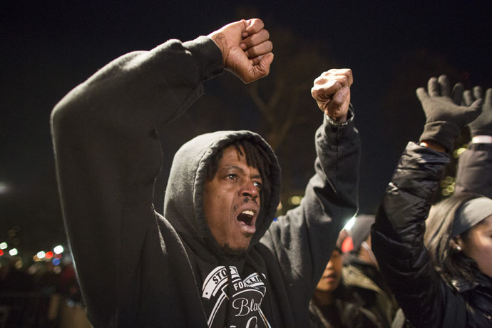 A protester yells "I can't breathe" during a protest against the decision by a Staten Island grand jury not to indict a police officer who used a chokehold in the death of Eric Garner in July, on December 4, 2014 in Boston, Massachusetts. (Scott Eisen/Getty Images/AFP)