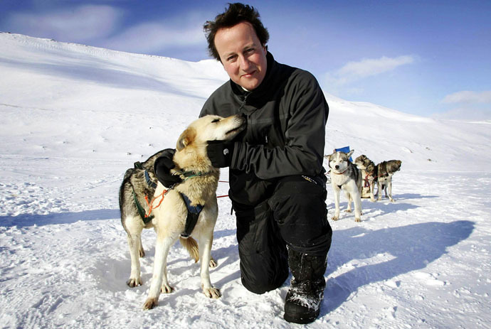 David Cameron stands on top of the Scott-Turner glacier with husky Troika on the island of Svalbard, Norway April 20, 2006. (Reuters)