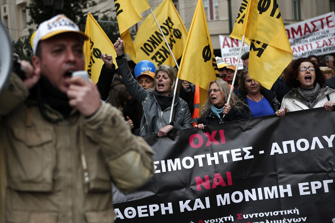 Protesters shout slogans during a 24-hour general strike in Athens November 27, 2014. (Reuters / Alkis Konstantinidis)