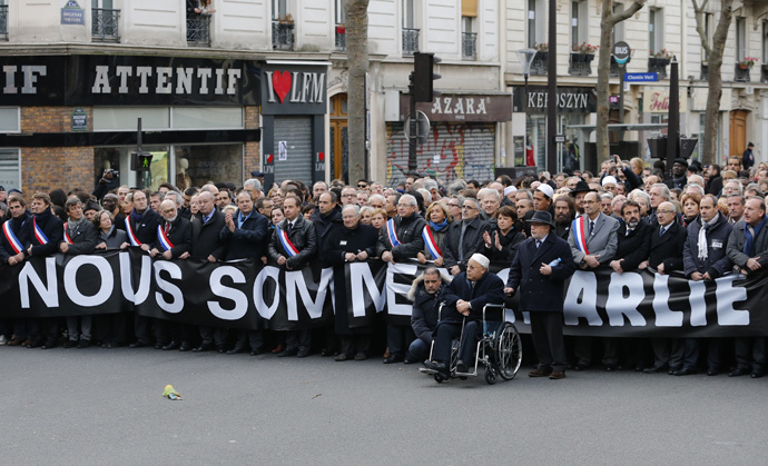 Paris Mosque rector Dalil Boubakeur (front), French political, religious and personalites take part in a solidarity march (Marche Republicaine) in the streets of Paris January 11, 2015. (Reuters / Stephane Mahe)