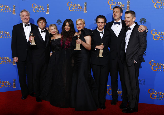 The cast of "Boyhood" poses backstage with their award for Best Motion Picture - Drama during the 72nd Golden Globe Awards in Beverly Hills, California January 11, 2015. (Reuters/Mike Blake)