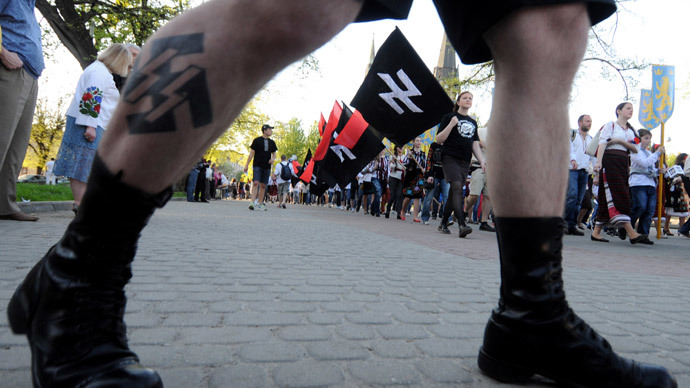 Supporters of the Ukrainian nationalist movement rally in downtown Lviv on April 28, 2012 to mark the 68th anniversary of the formation of the Ukrainian Galacian Division of the Waffen SS. (AFP Photo / Yuriy Dyachyshyn)