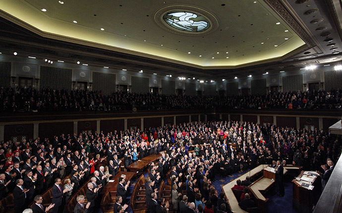 U.S. President Barack Obama receives a standing ovation as he begins to deliver his State of the Union address to a joint session of the U.S. Congress on Capitol Hill in Washington, January 20, 2015. (Reuters/Jonathan Ernst)