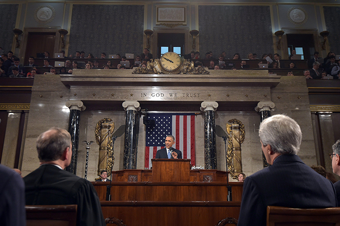 U.S. President Barack Obama (C) delivers his State of the Union address to a joint session of Congress on Capitol Hill in Washington (Reuters / Mandel Ngan)