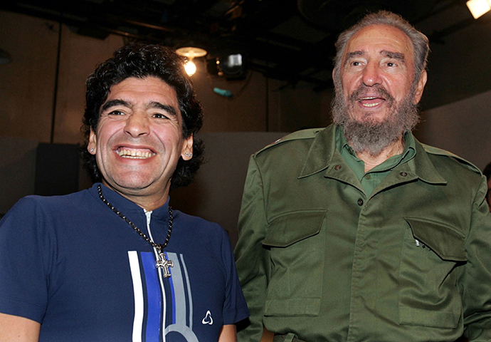 ARCHIVE PHOTO: Former Argentine soccer player Diego Maradona (L) and Cuban President Fidel Castro smile after appearing together on a live television broadcast in Havana, October 27, 2005 (Reuters)