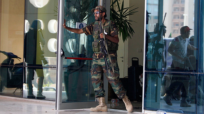 ISIS-affiliated gunmen storm Tripoli hotel, blow up car bomb & kill guards