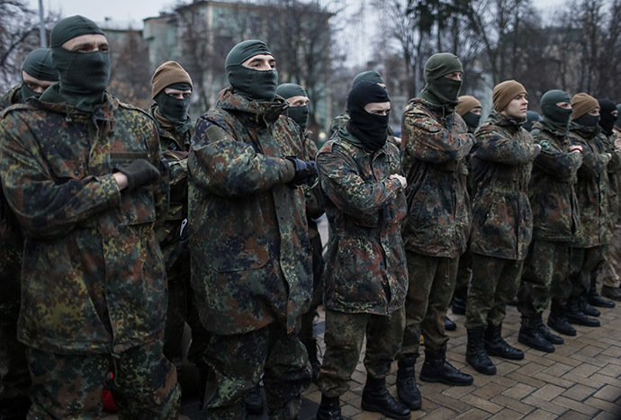 New volunteers for the Ukrainian Interior Ministry's Azov battalion line up before they depart to the frontlines in eastern Ukraine, in central Kiev January 17, 2015. (Reuters/Gleb Garanich)