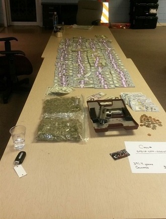 Marijuana, firearm and currency seized from Letroy Guion (Starke Police Department)