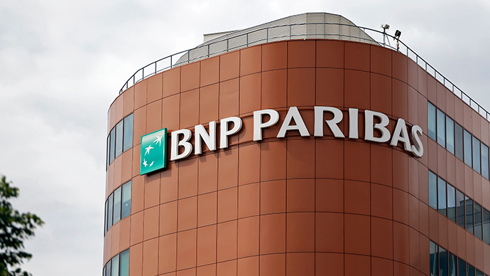 BNP 2014 profit falls 97% after record US settlement