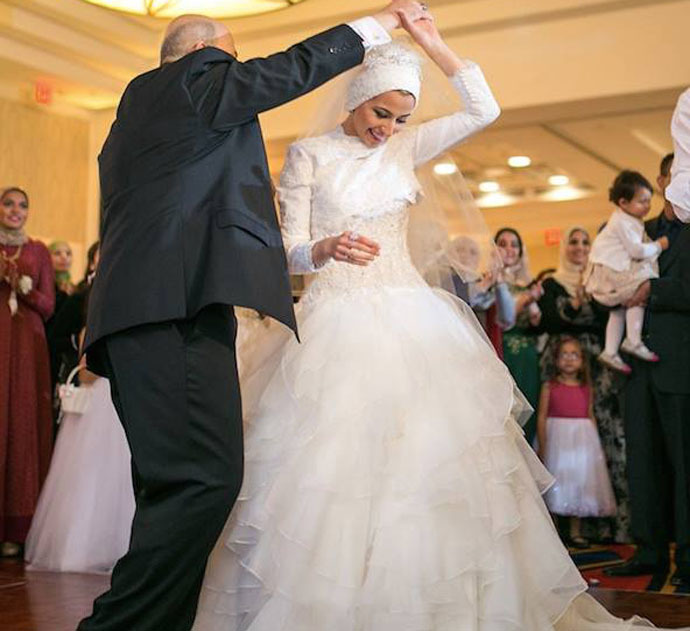 Yusor Mohammad Abu-Salha dancing with her father at her wedding. Photo from facebook.com