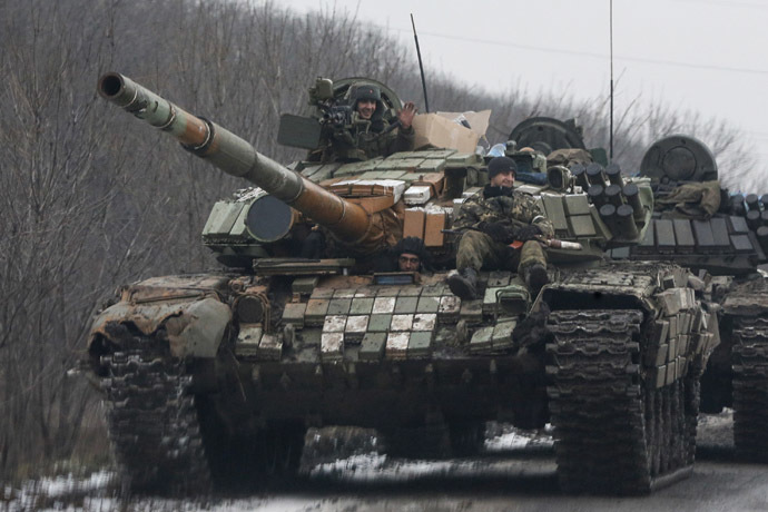 Donetsk rebels ride on a tank in Vuhlehirsk, Donetsk region February 6, 2015. (Reuters/Maxim Shemeto)