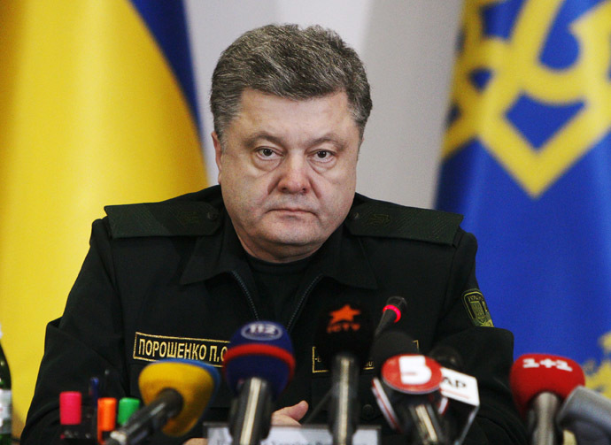 Ukraine's President Petro Poroshenko talks to military staff in Kiev February 14, 2015. (Reuters/Valentyn Ogirenko)
