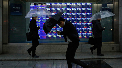 Japan escapes recession, growth weaker than forecast