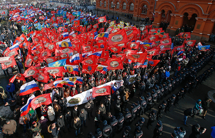 People attend an "Anti-Maidan" rally to protest against the 2014 Kiev uprising, which ousted President Viktor Yanukovich, in Moscow February 21, 2015 (Reuters / Sergey Karpukhin)