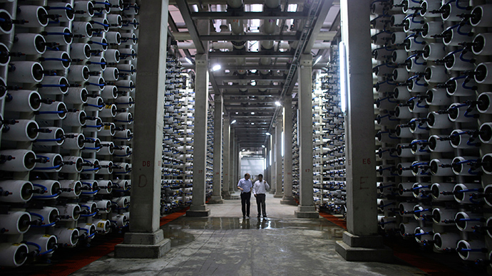People walk in a desalination plant (Reuters / Nir Elias)
