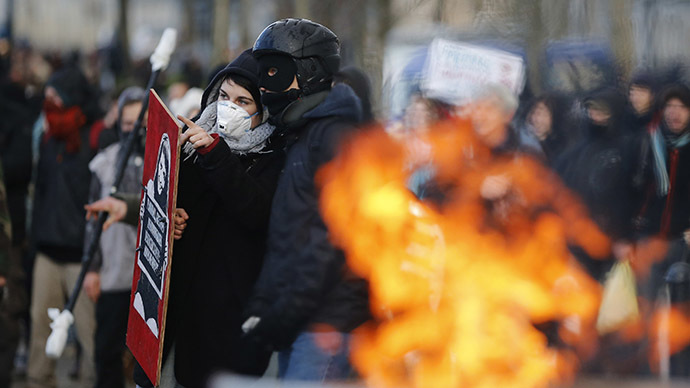 Police use water cannons, tear gas to break up anti-brutality protests in France