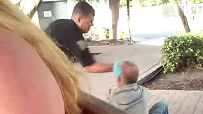 Florida police officer suspended after slapping homeless man